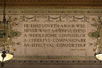 Photo of a carved marble sign that says, He that loveth a book will never want a faithful friend, a wholesome
            counselor, a cheeful companion, an effectual comforter, Isaac Barrow